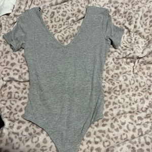 Grey body suit thong